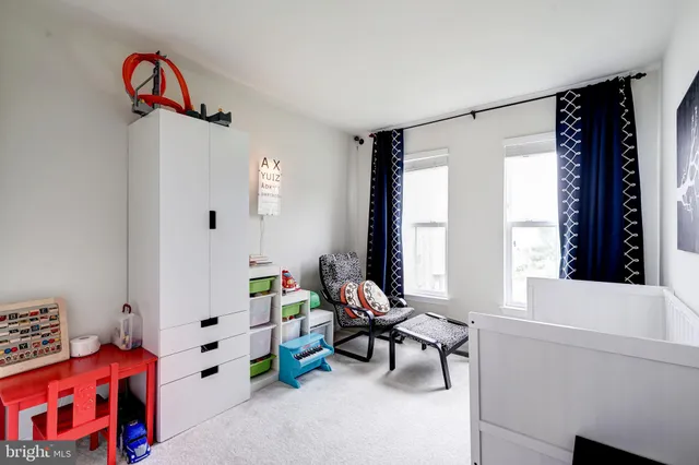 a bathroom with a granite countertop toilet sink and shower