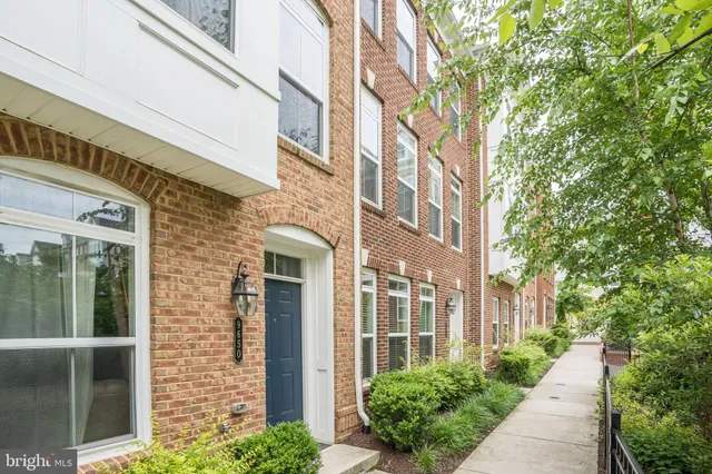 a view of a brick building next to a building