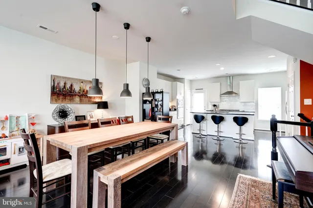 a living room with furniture a couch and a window