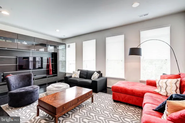 a kitchen with a table and chairs in it