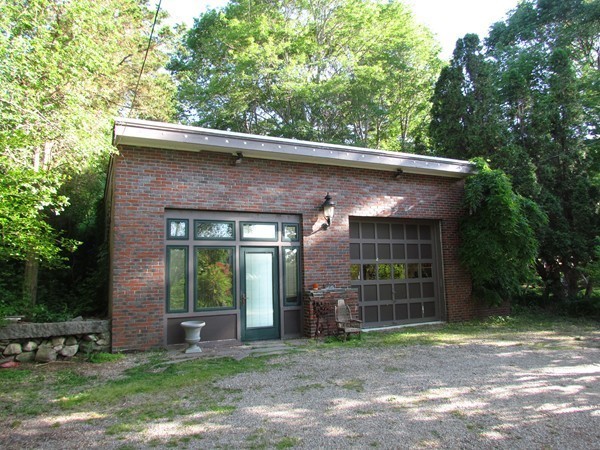 99 First Parish Road Scituate, MA 02066 - Photo 24 of 30 a front view of a house with garden