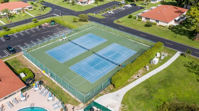 an aerial view of a tennis ground