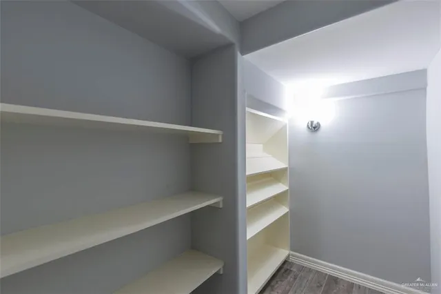 a view of an empty walk in closet