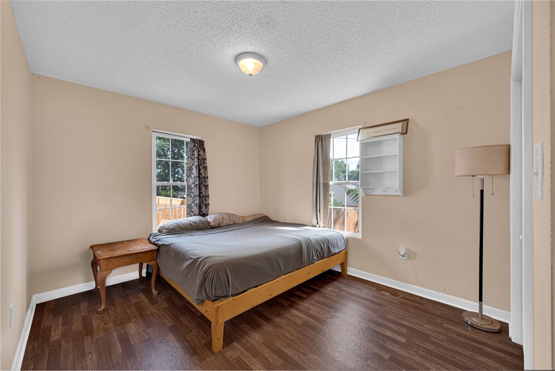 1020 Elizabeth Street Anderson, SC 29624 - Photo 16 of 22 A comfortable bedroom featuring durable wood flooring and ample natural light.