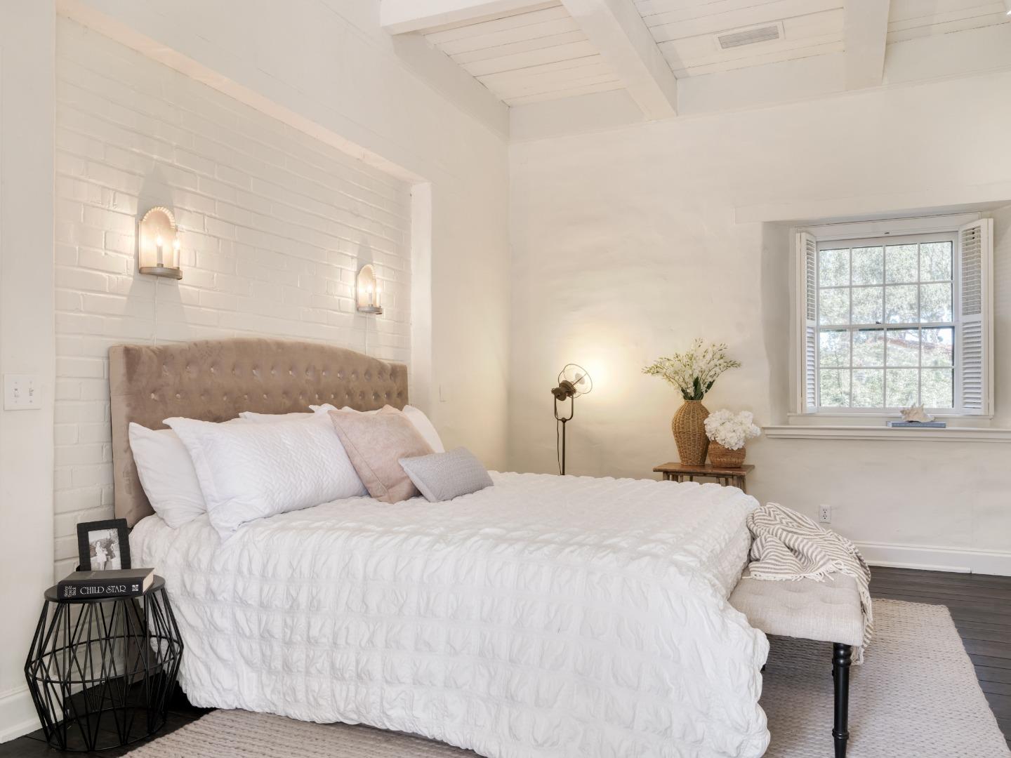 150 Littlefield Road Monterey, CA 93940 - Photo 12 of 51 a bedroom with a bed and a window