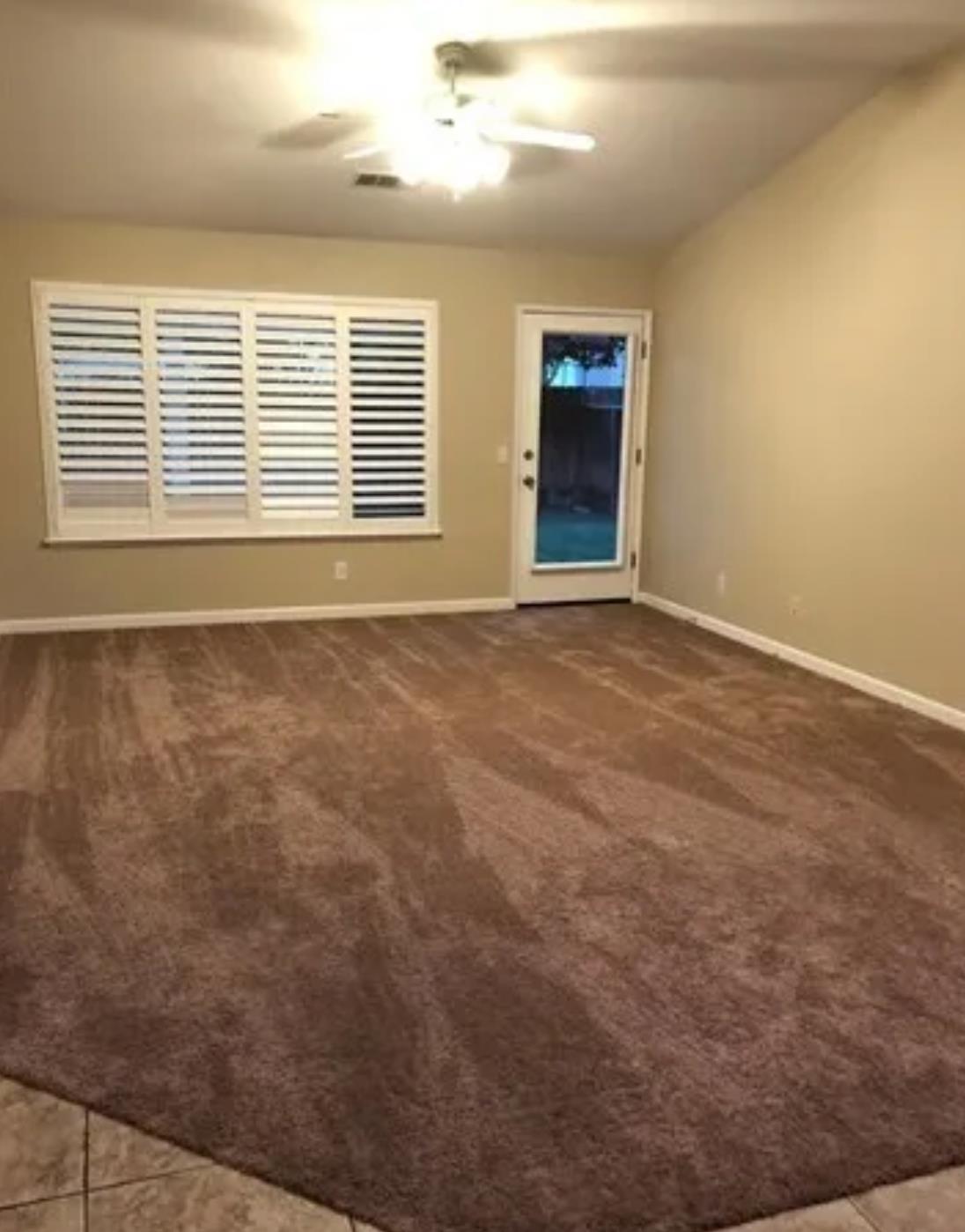 1787 Edgewood Court Merced, CA 95340 - Photo 4 of 9 a view of an empty room with a window