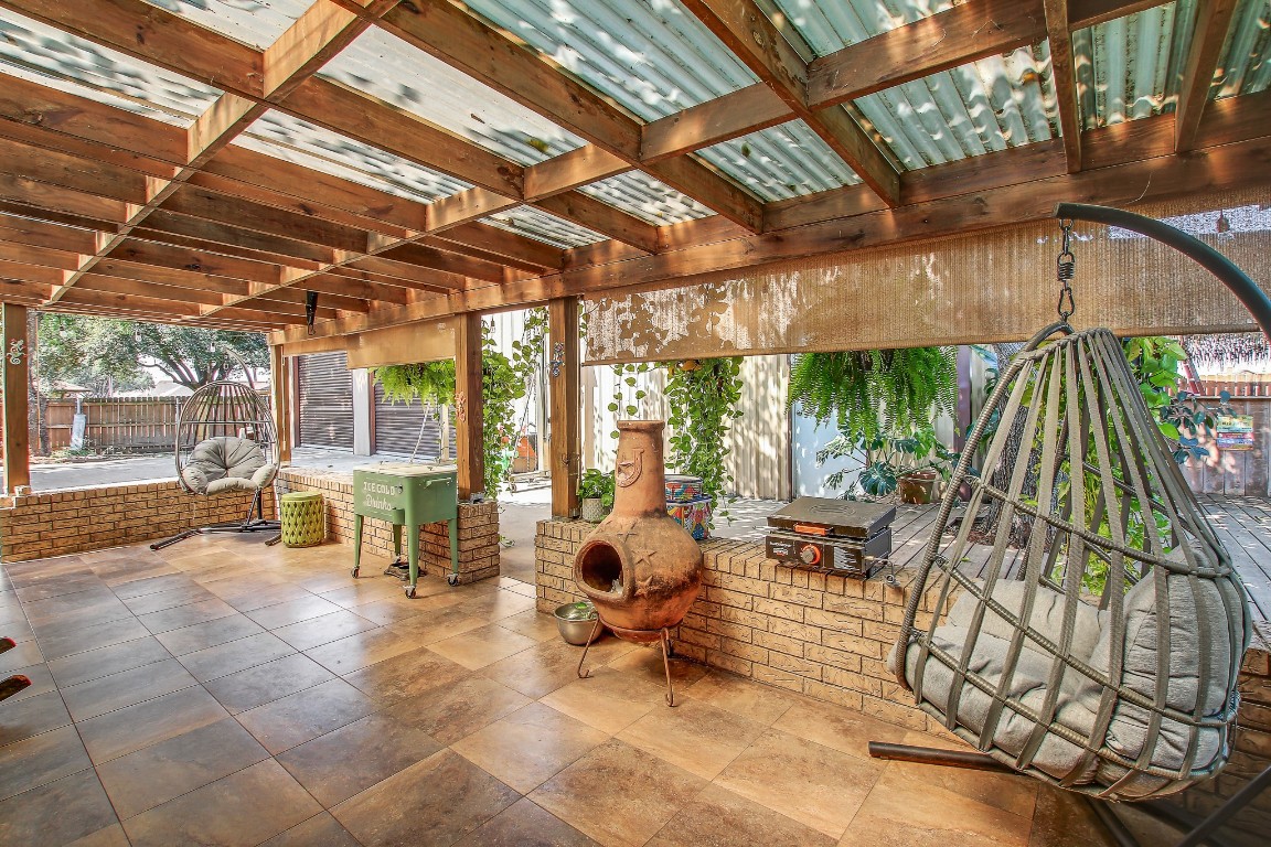 105 Frederick Lane Thorndale, TX 76577 - Photo 12 of 12 a building outdoor space with patio furniture and potted plants