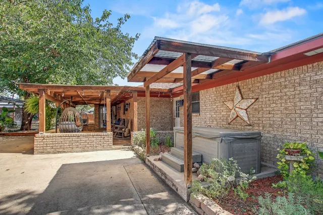 a view of a pathway with a patio
