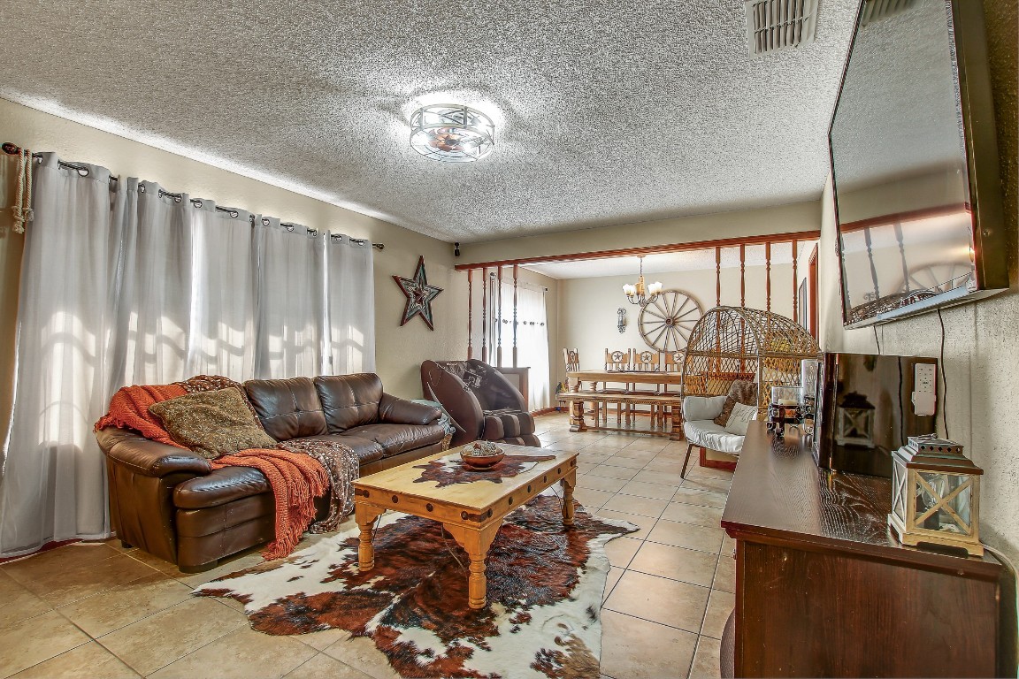 105 Frederick Lane Thorndale, TX 76577 - Photo 3 of 12 a living room with furniture and a large window