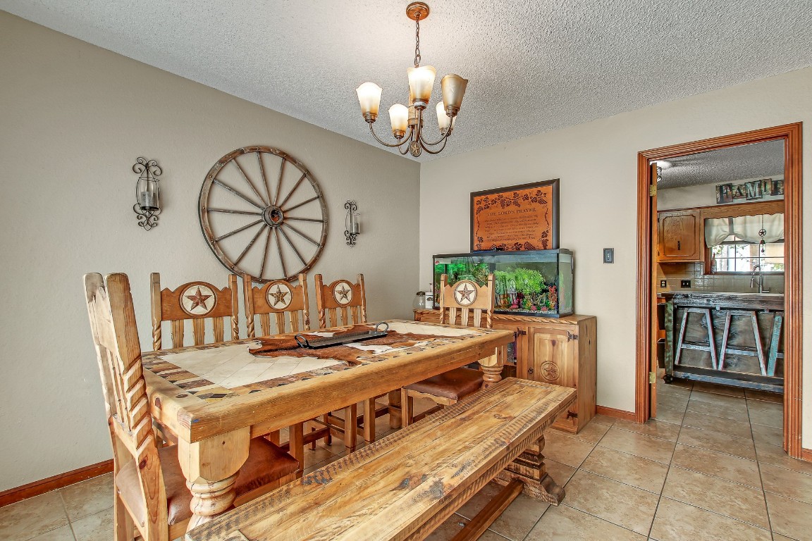105 Frederick Lane Thorndale, TX 76577 - Photo 4 of 12 a view of a dining room with furniture window and wooden floor