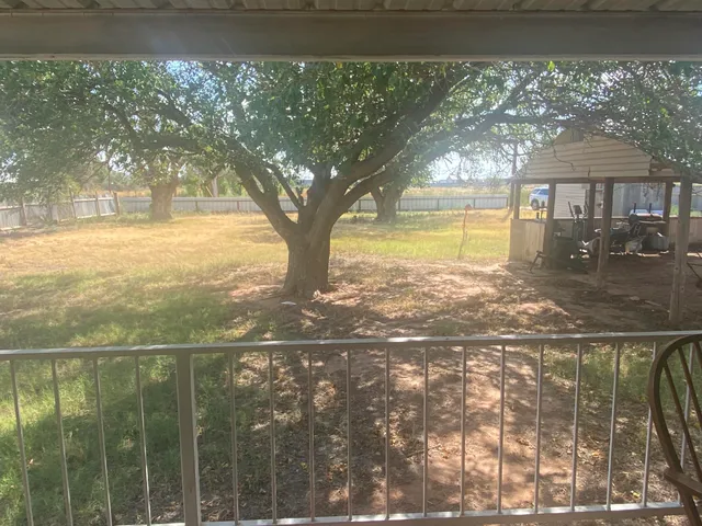 a view of a balcony with an outdoor space