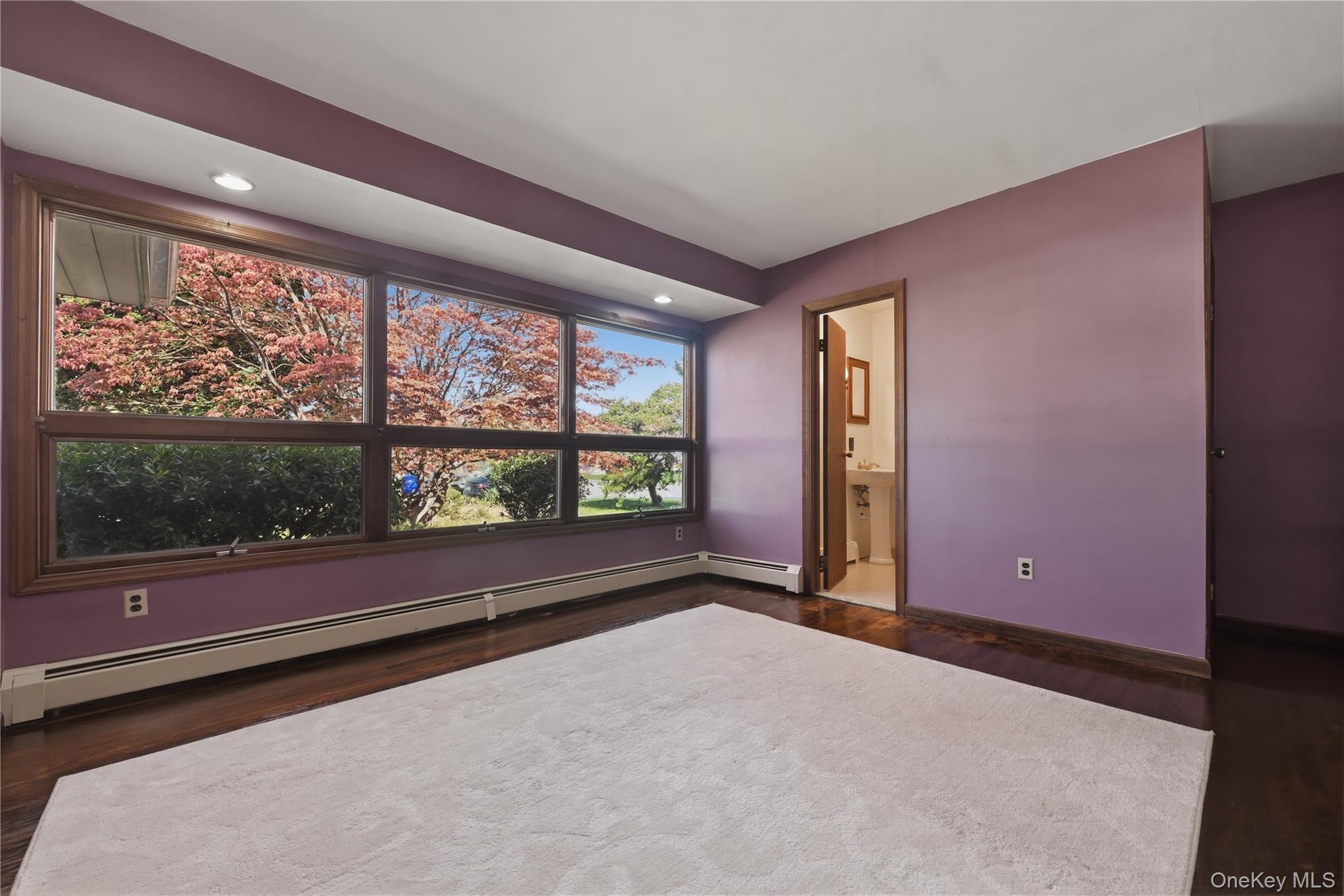 19 Gaymor Lane Commack, NY 11725 - Photo 14 of 25 an empty room with large windows