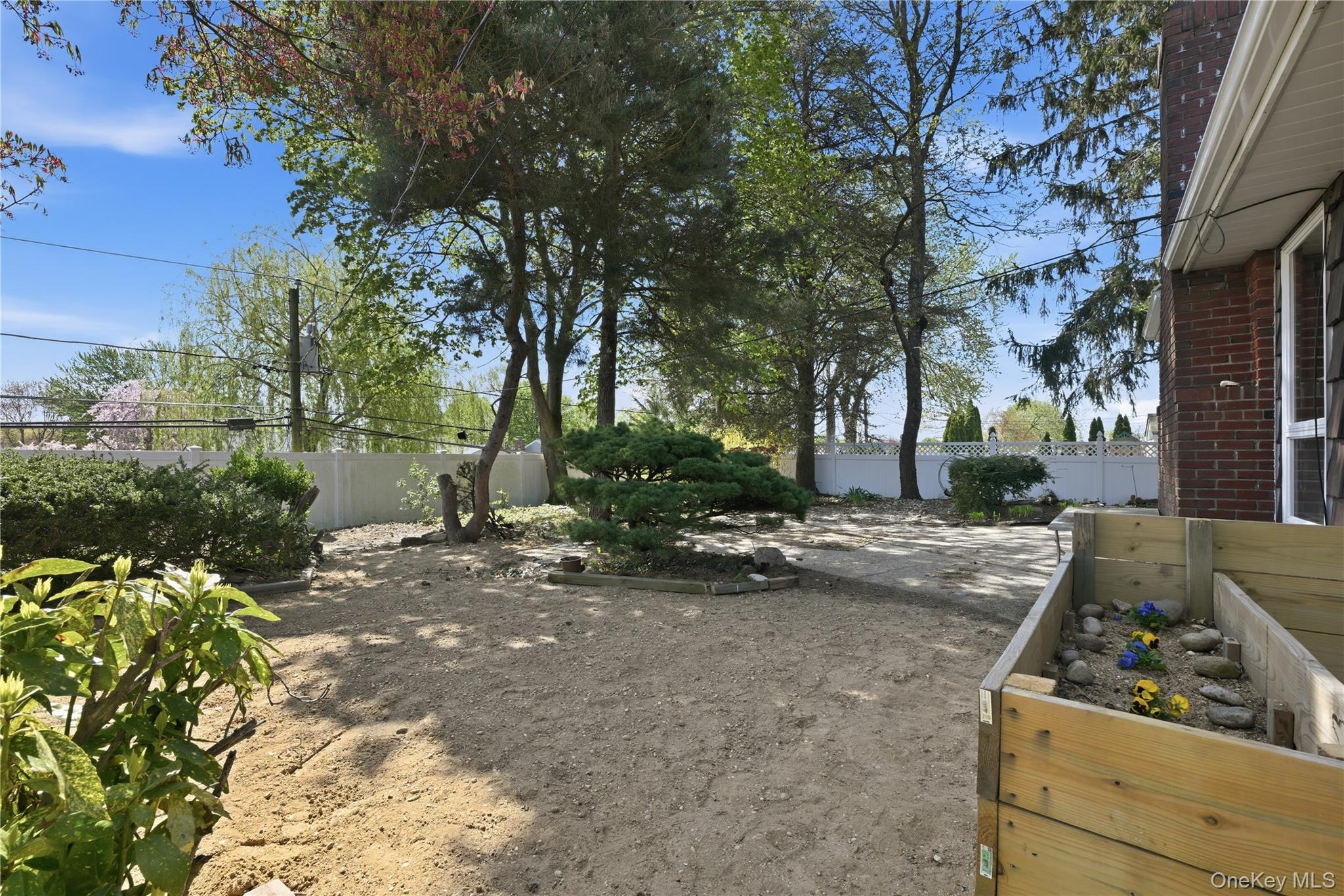 19 Gaymor Lane Commack, NY 11725 - Photo 21 of 25 a view of a park with plants and trees