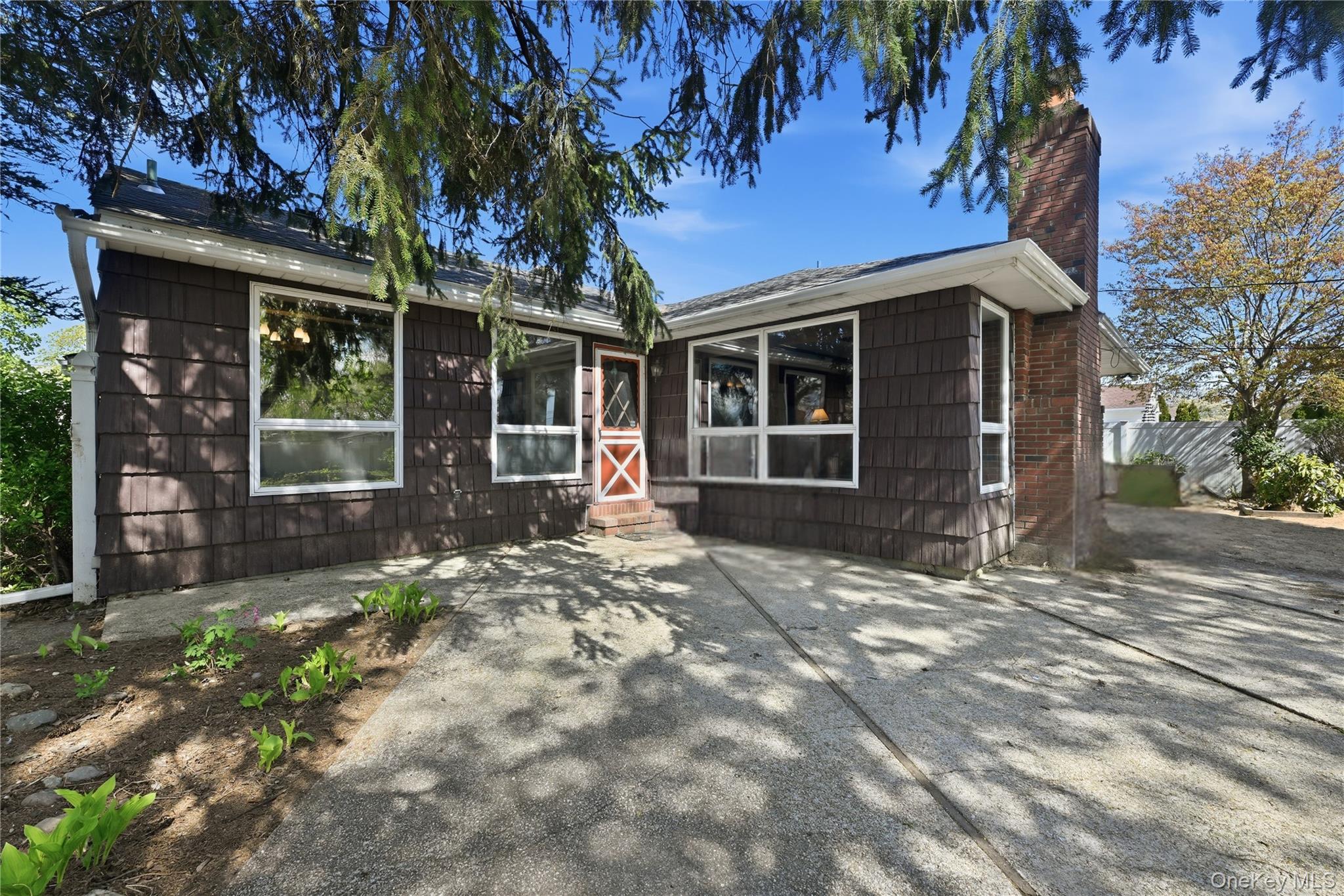 19 Gaymor Lane Commack, NY 11725 - Photo 22 of 25 a view of a house with a tree in front