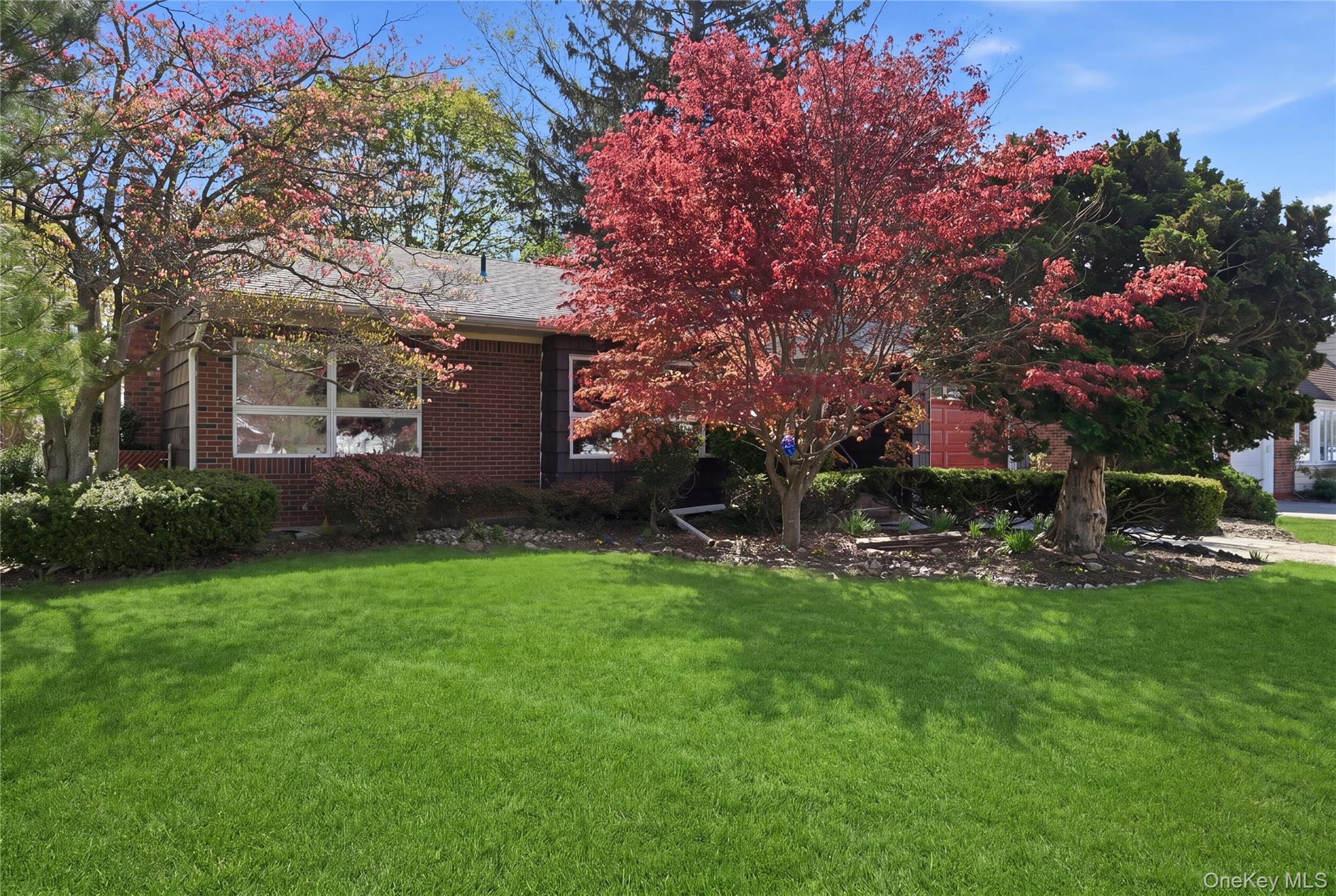 19 Gaymor Lane Commack, NY 11725 - Photo 3 of 25 a view of a house with backyard and sitting area