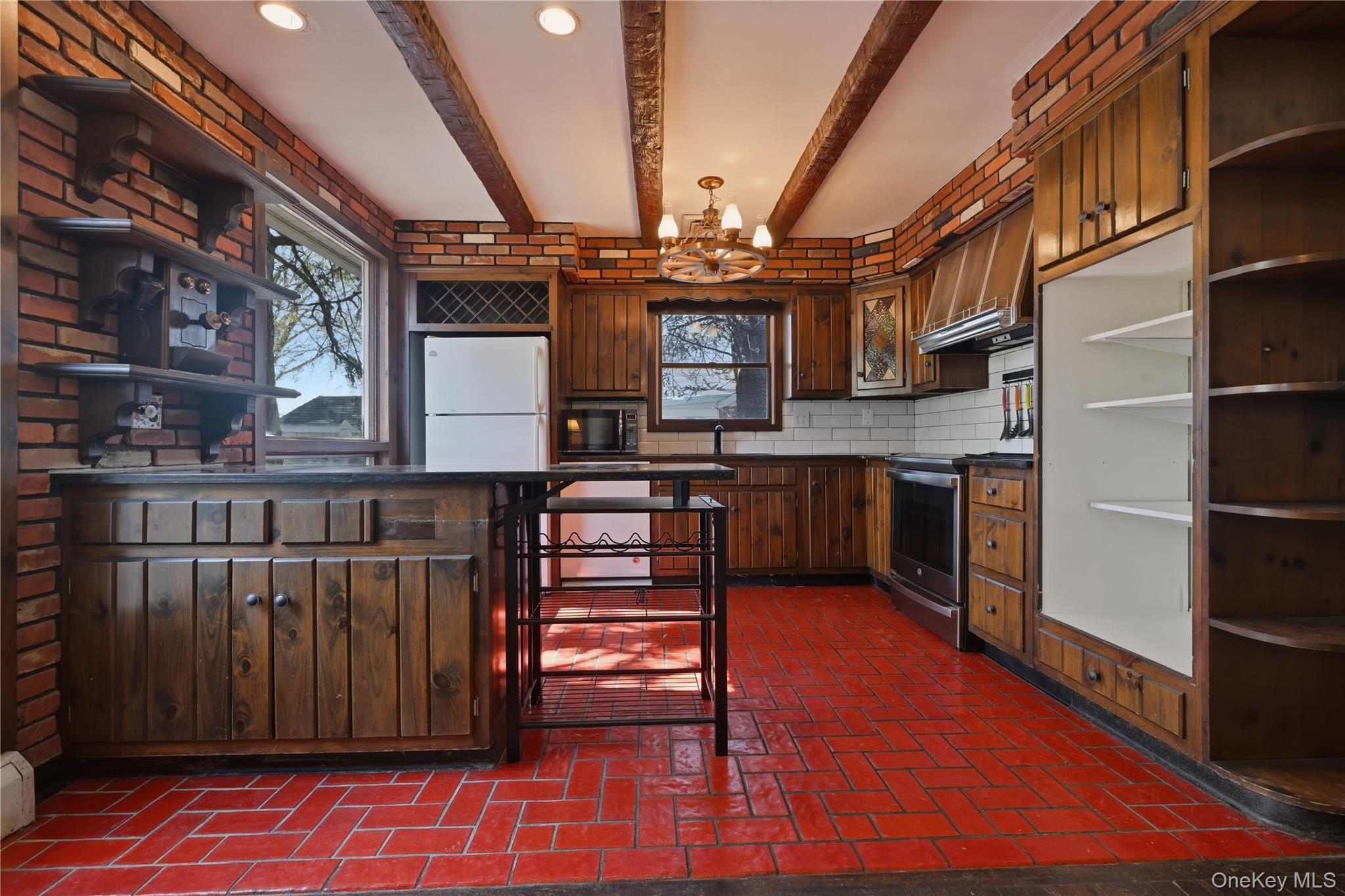 19 Gaymor Lane Commack, NY 11725 - Photo 6 of 25 a view of a kitchen with stainless steel appliances granite countertop a stove and a sink
