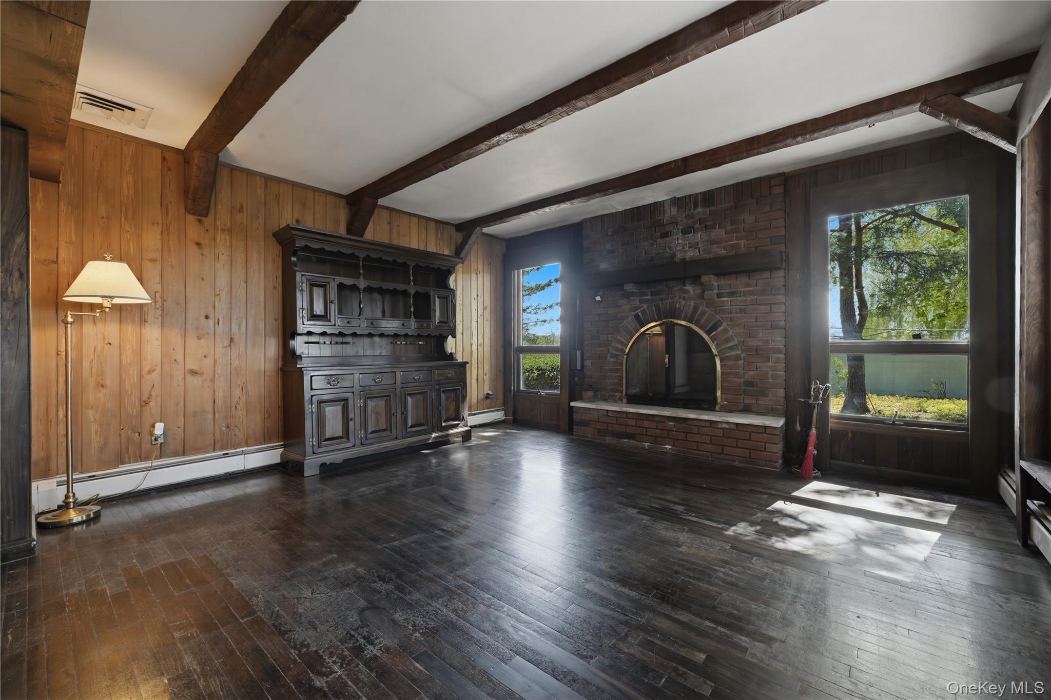 19 Gaymor Lane Commack, NY 11725 - Photo 9 of 25 a view of a livingroom with wooden floor and furniture