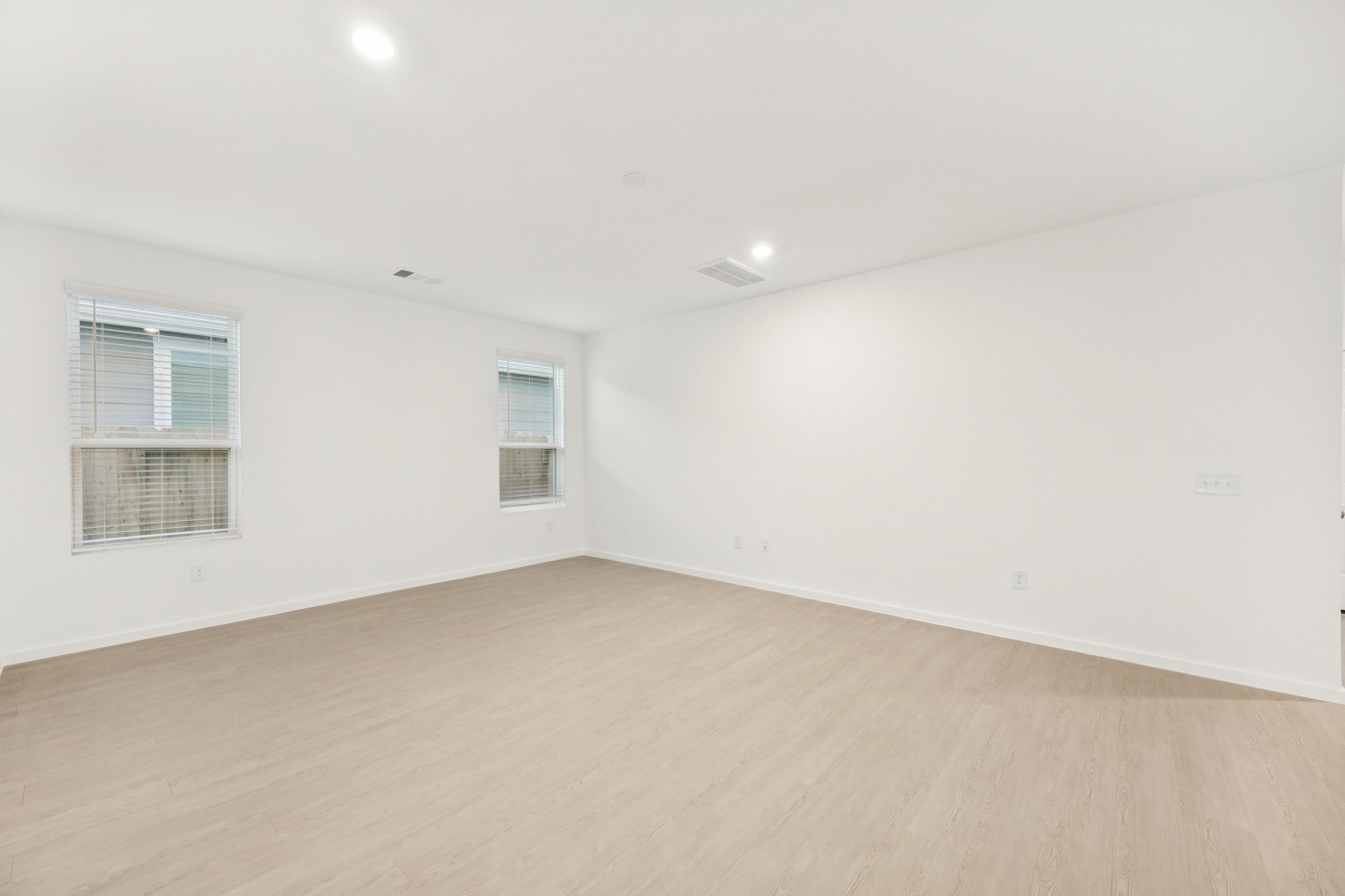 26266 Arrowleaf Drive Magnolia, TX 77355 - Photo 11 of 30 an empty room with a empty space and windows