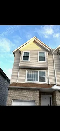 a front view of a house with windows