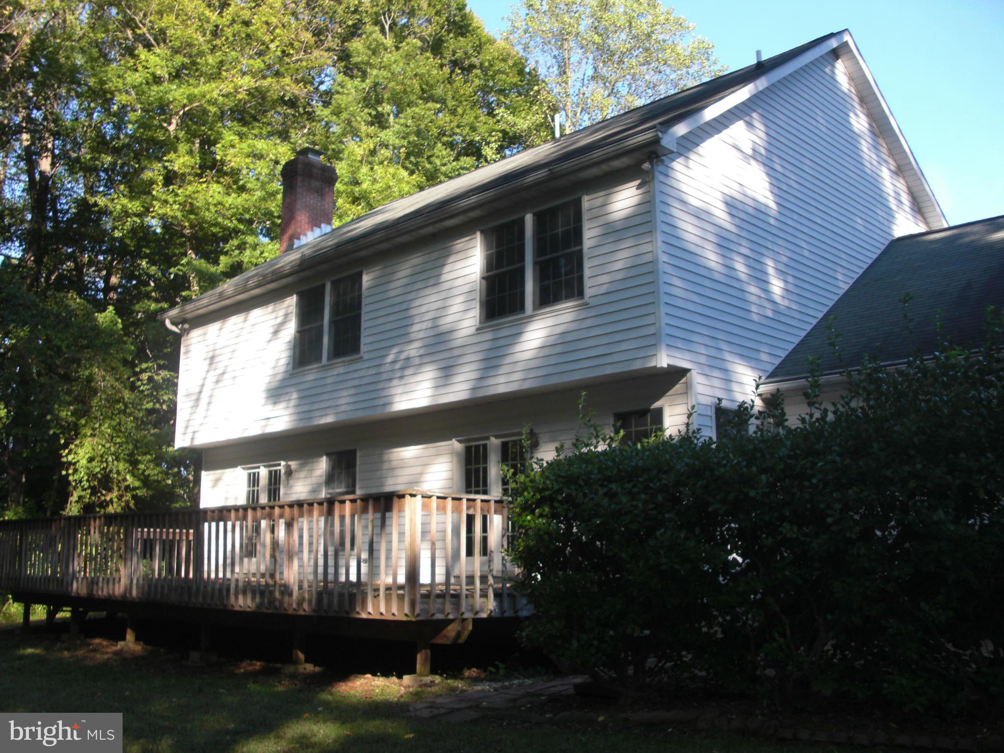 616 Westgate Road Aberdeen, MD 21001 - Photo 2 of 11 a front view of a house with a garden