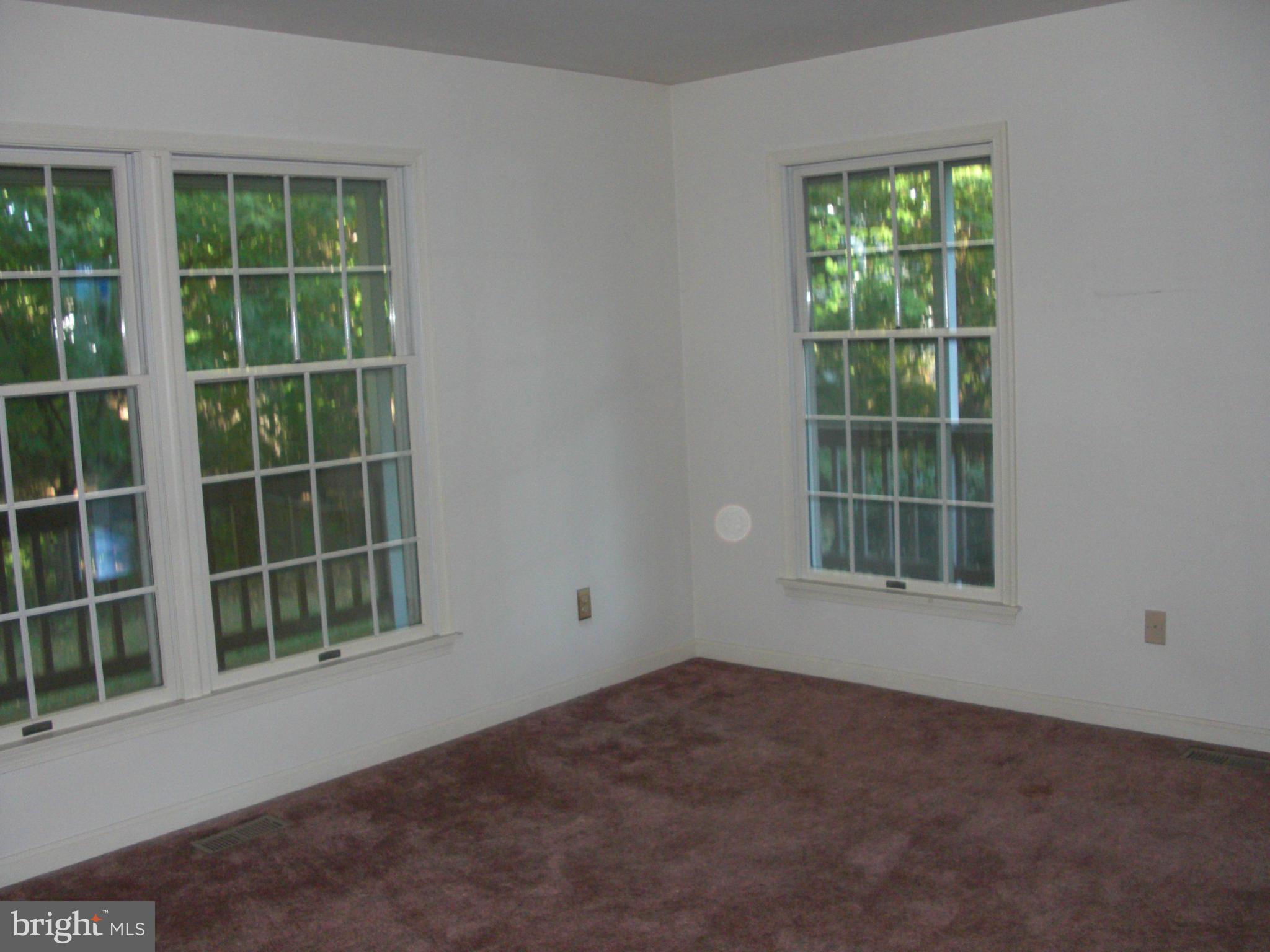 616 Westgate Road Aberdeen, MD 21001 - Photo 5 of 11 a view of an empty room with a window