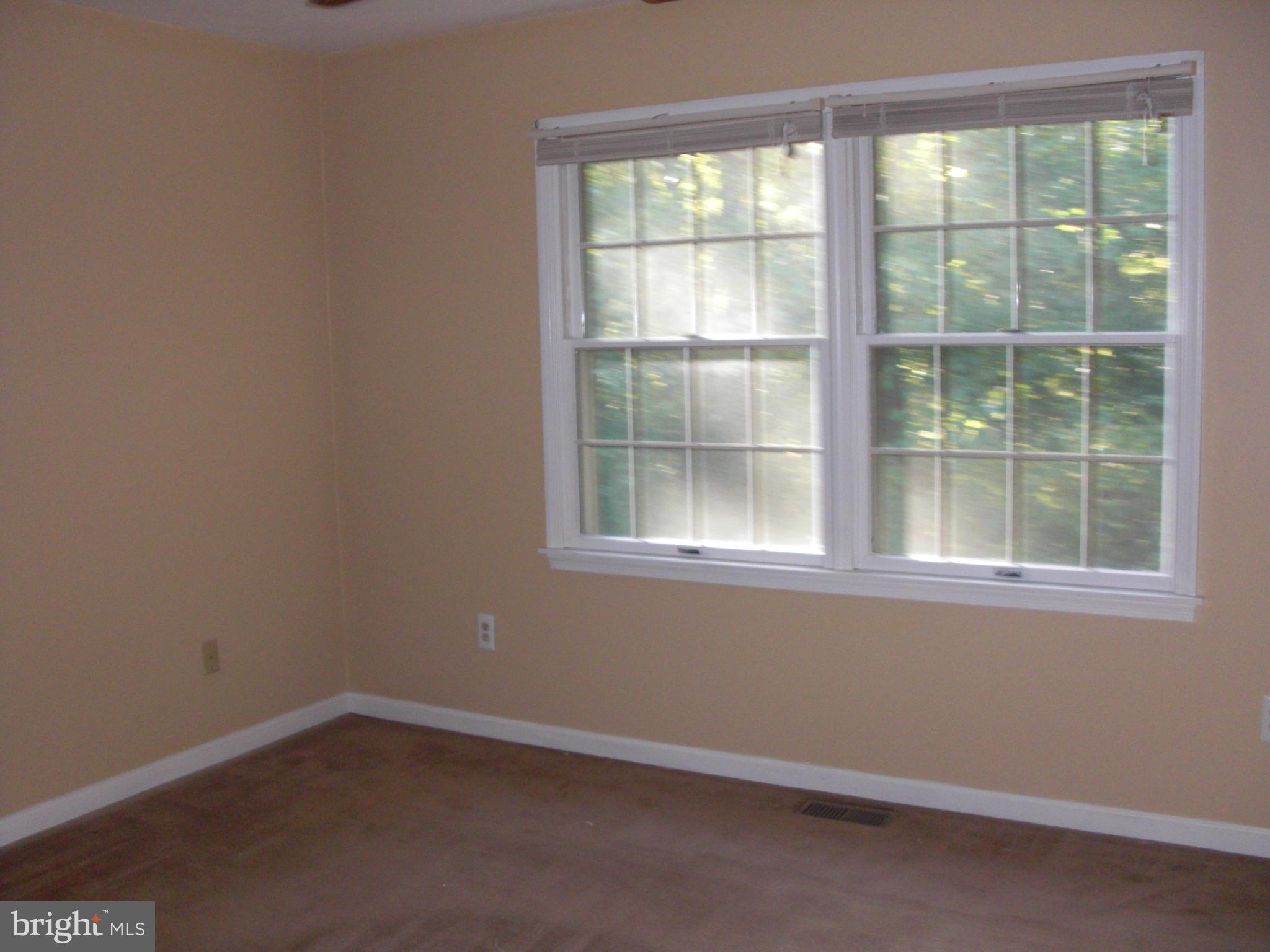 616 Westgate Road Aberdeen, MD 21001 - Photo 10 of 11 an empty room with a window