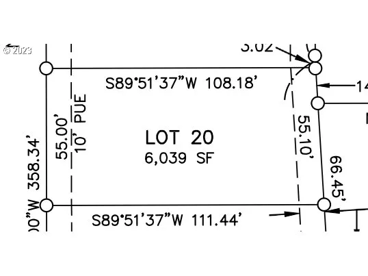 a picture of a book and a white bed