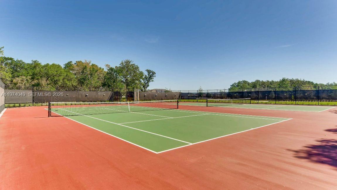 1556 Gladewater Road, Unit 1556 Kissimmee, FL 34744 - Photo 25 of 26 a view of a tennis court