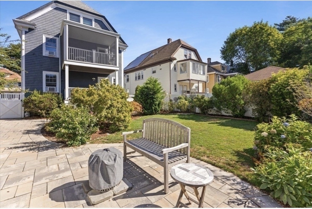 15 Belvoir Road, Unit 2 Milton, MA 02186 - Photo 13 of 13 a house view with a seating space and garden view