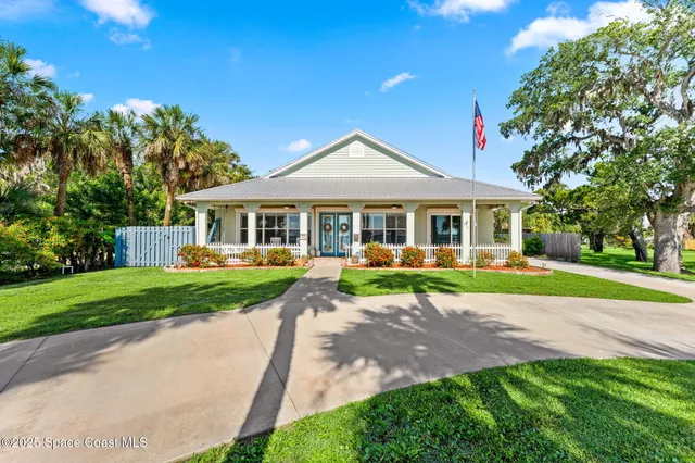 a view of swimming pool with outdoor seating