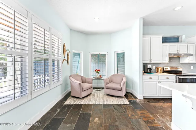 a view of balcony with wooden floor