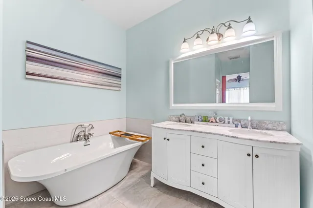 a view of a house with a yard patio and swimming pool