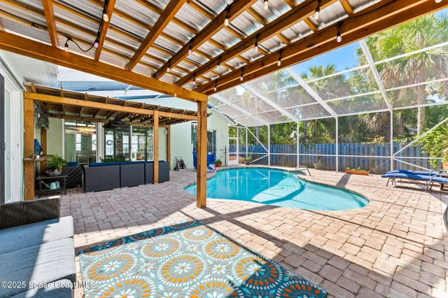 a kitchen with stainless steel appliances kitchen island granite countertop a sink and cabinets