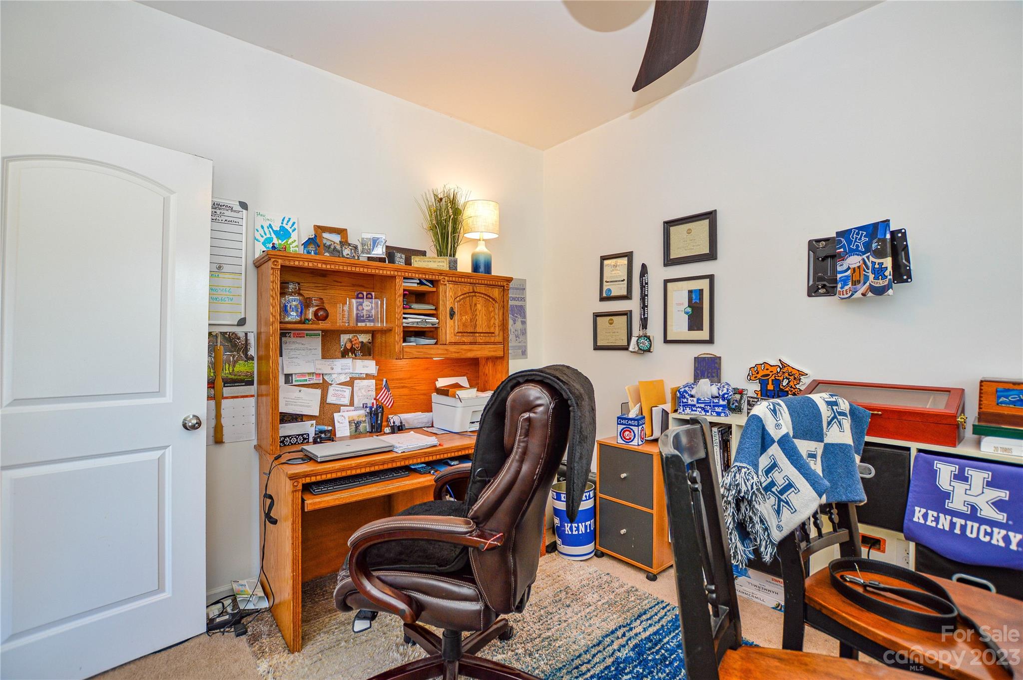 8191 Thornton Street Locust, NC 28097 - Photo 13 of 44 a view of a workspace with furniture and toys