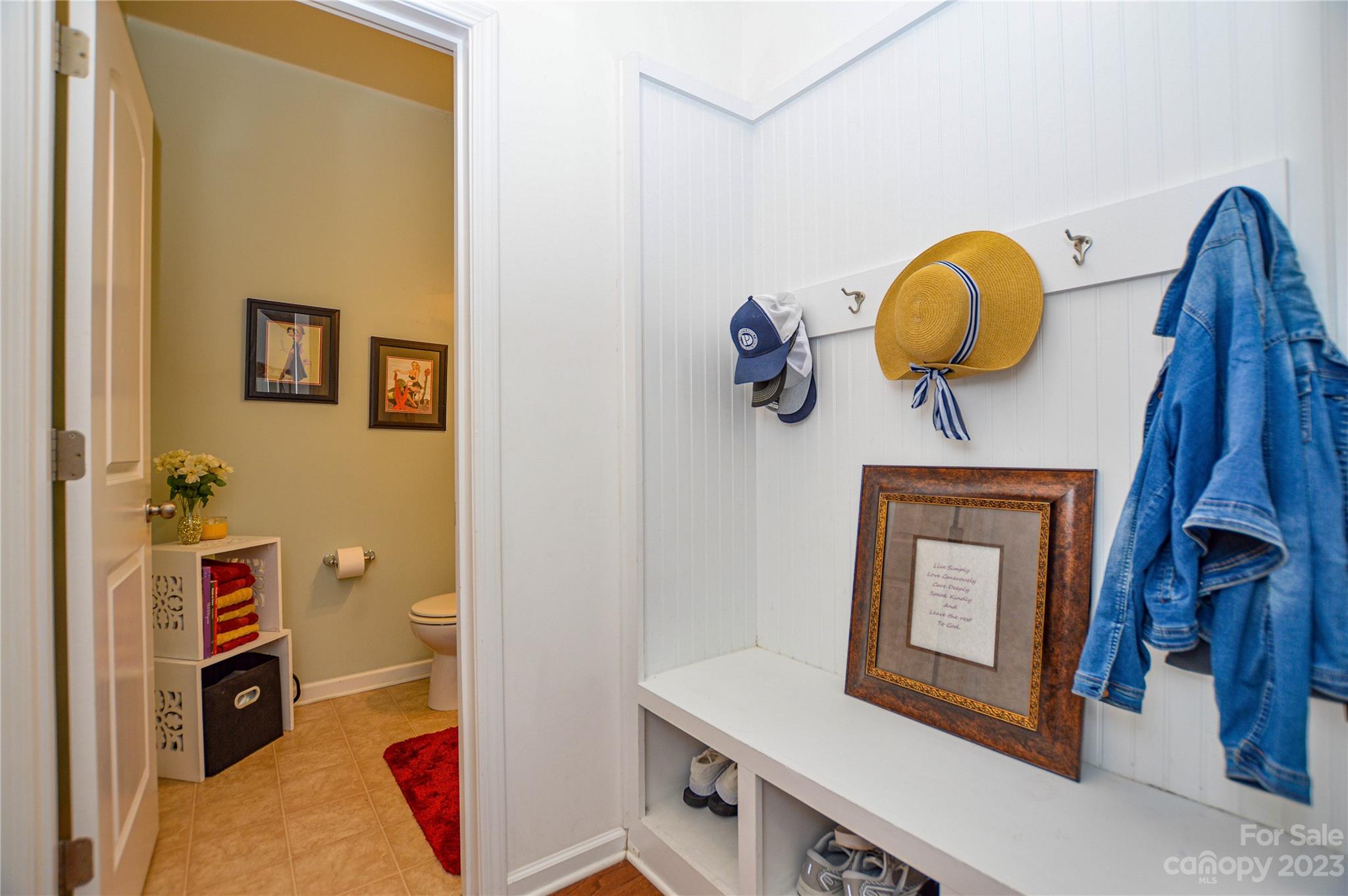 8191 Thornton Street Locust, NC 28097 - Photo 14 of 44 a bathroom with a sink and mirror