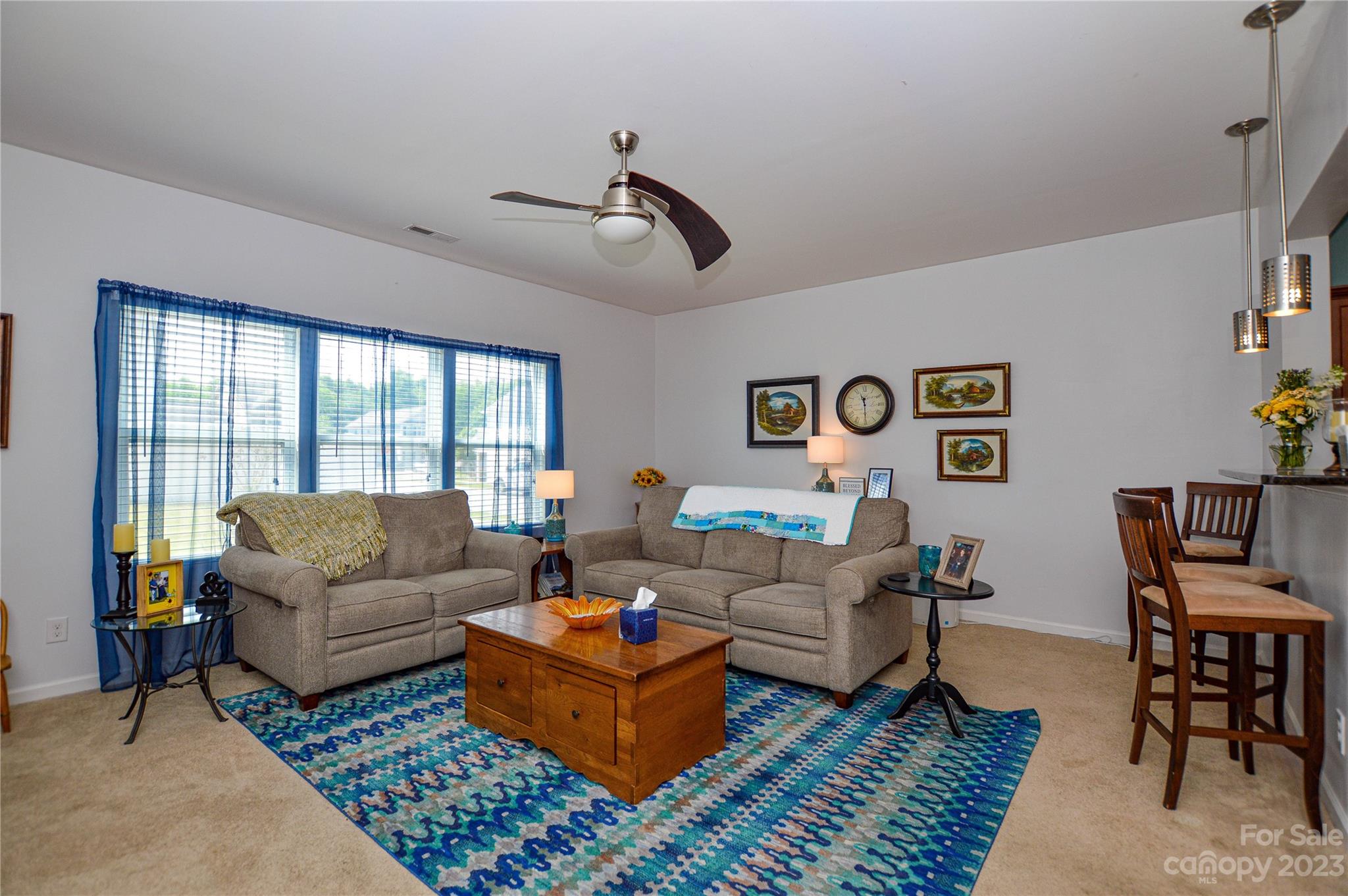 8191 Thornton Street Locust, NC 28097 - Photo 23 of 44 a living room with furniture or couch and a window