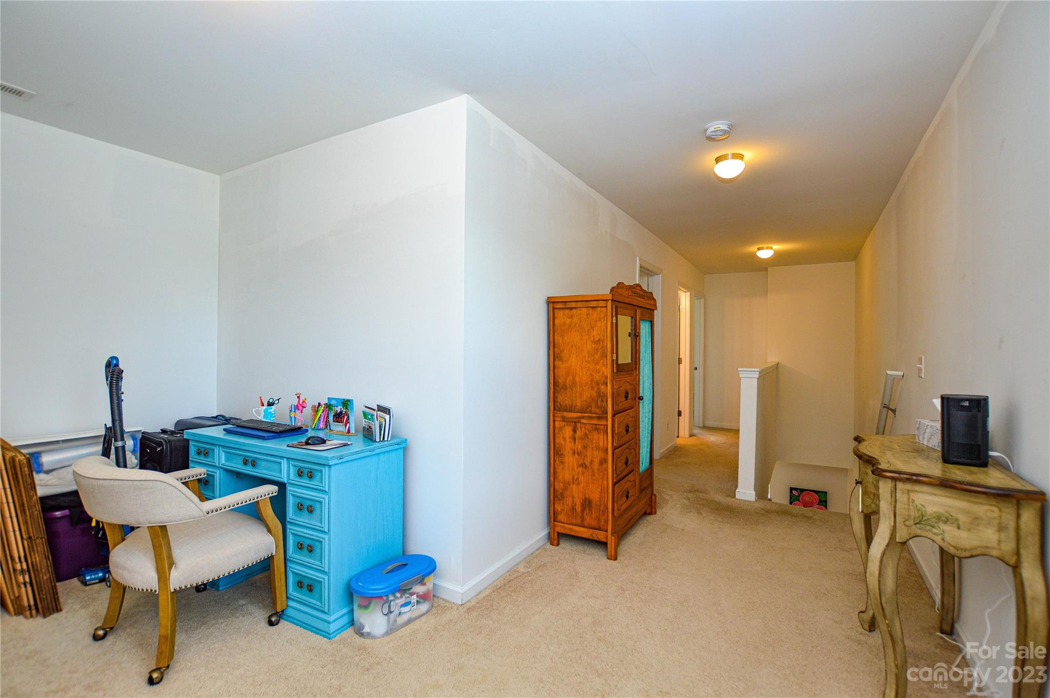 8191 Thornton Street Locust, NC 28097 - Photo 28 of 44 a room with furniture and gym equipment
