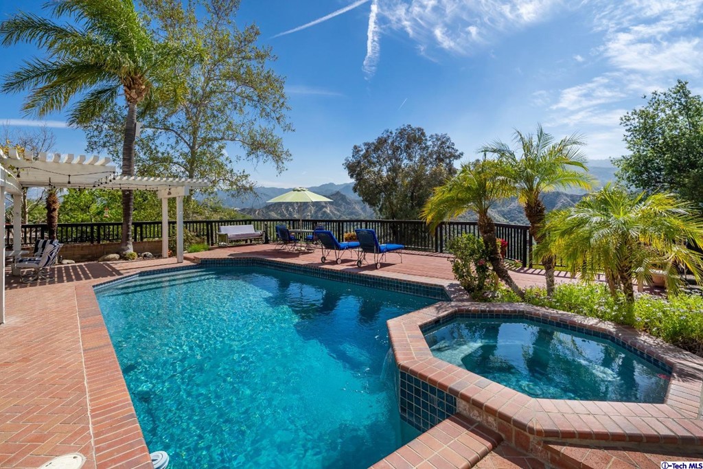 24718 Sagecrest Circle Newhall, CA 91381 - Photo 18 of 36 a view of swimming pool with chairs