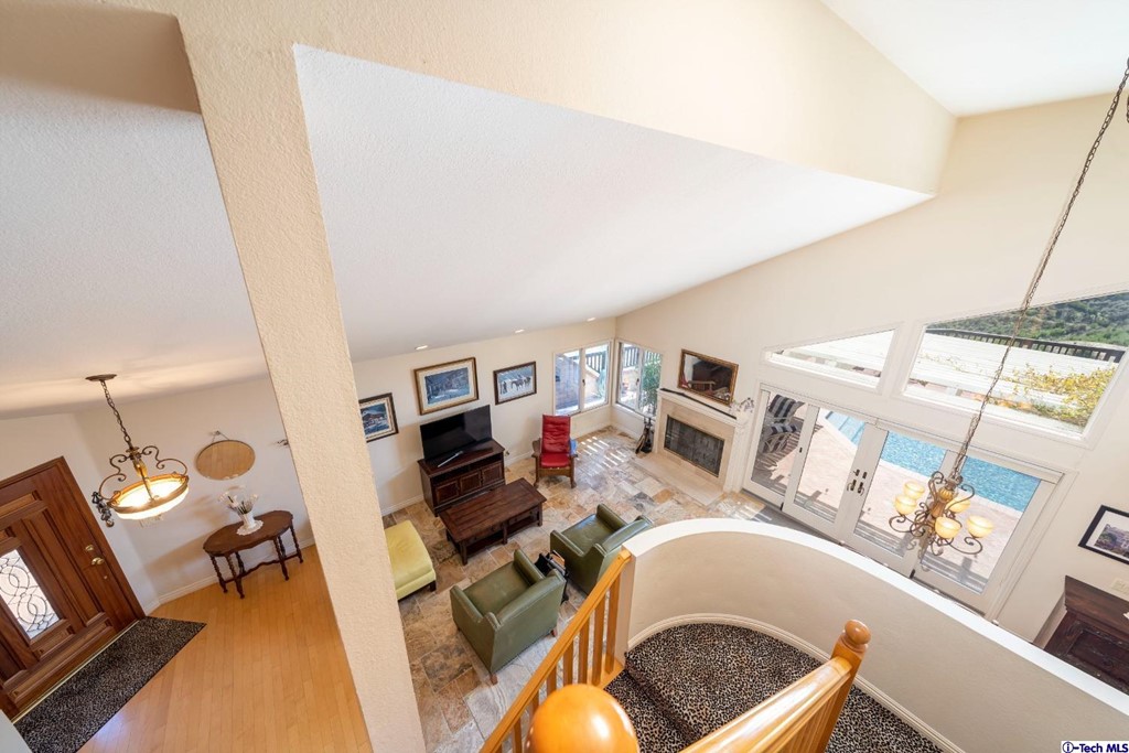 24718 Sagecrest Circle Newhall, CA 91381 - Photo 28 of 36 a living room with furniture and a flat screen tv