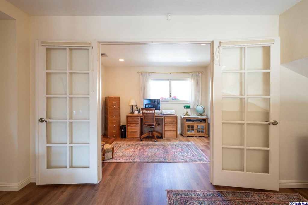24718 Sagecrest Circle Newhall, CA 91381 - Photo 29 of 36 a living room with furniture and a wooden floor