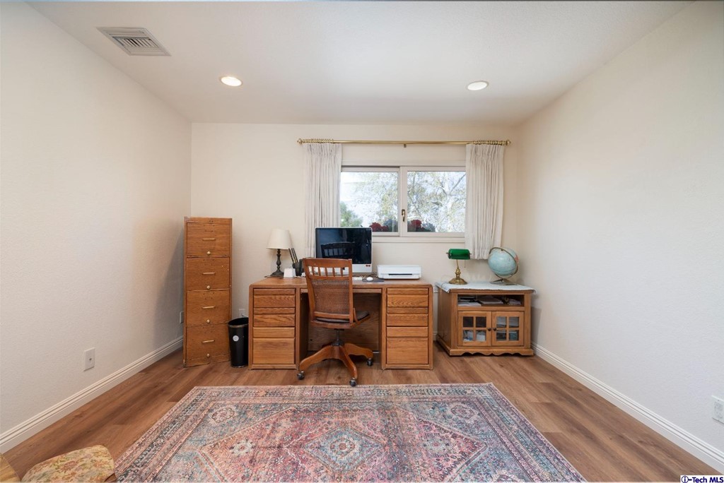 24718 Sagecrest Circle Newhall, CA 91381 - Photo 30 of 36 a workspace with furniture