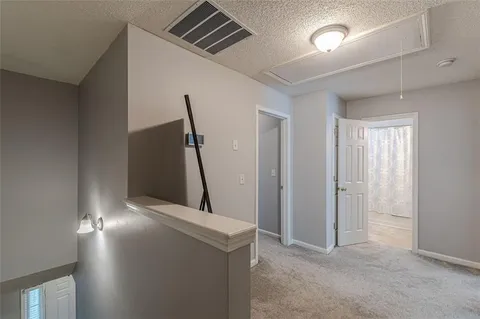 a bed room with a bed and a window