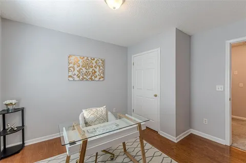a view of a hallway with closet