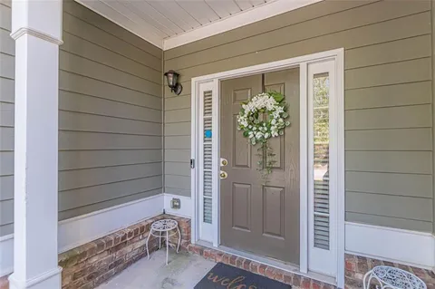 a view of entryway with wooden floor