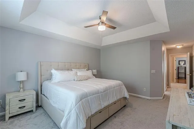 an empty room with closet and a bathroom