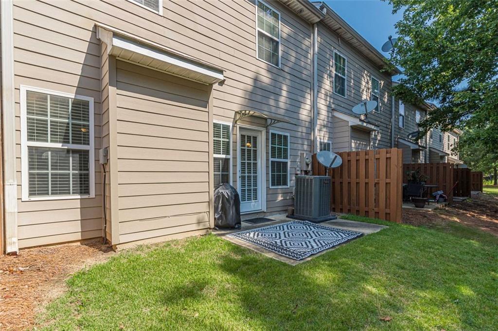 7640 Rutgers Circle Fairburn, GA 30213 - Photo 49 of 49 a view of a backyard with a garden