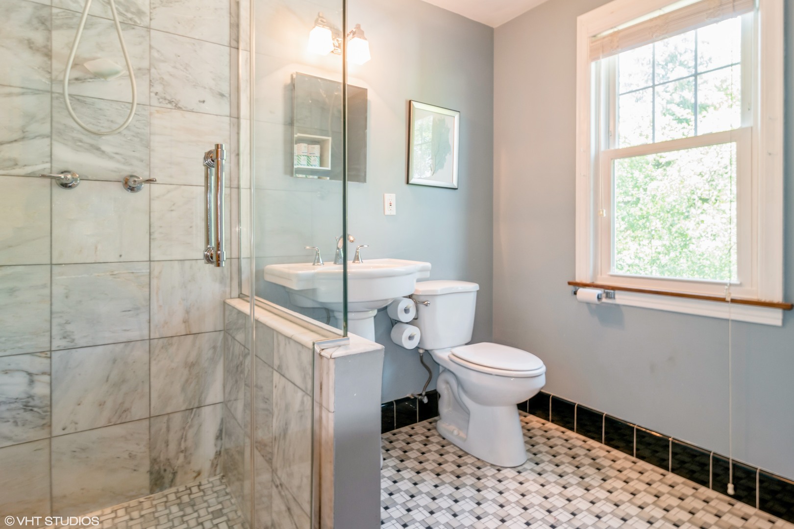 528 Selborne Road Riverside, IL 60546 - Photo 17 of 21 a bathroom with a toilet sink and a shower