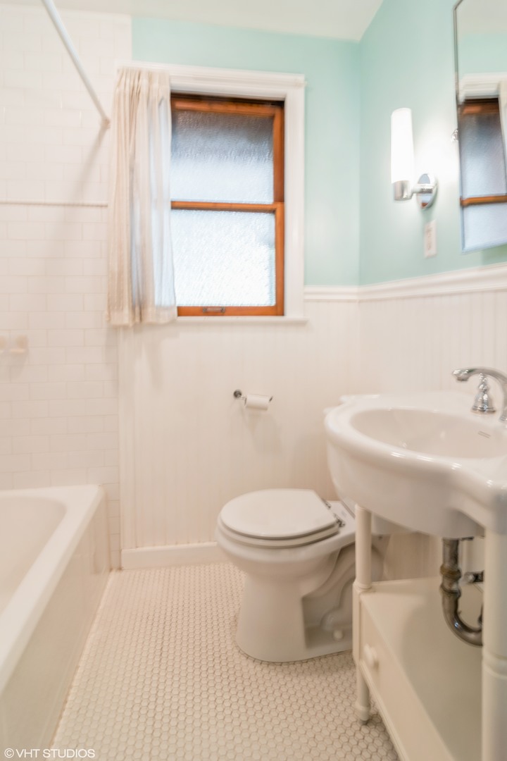 528 Selborne Road Riverside, IL 60546 - Photo 18 of 21 a bathroom with a sink toilet and shower