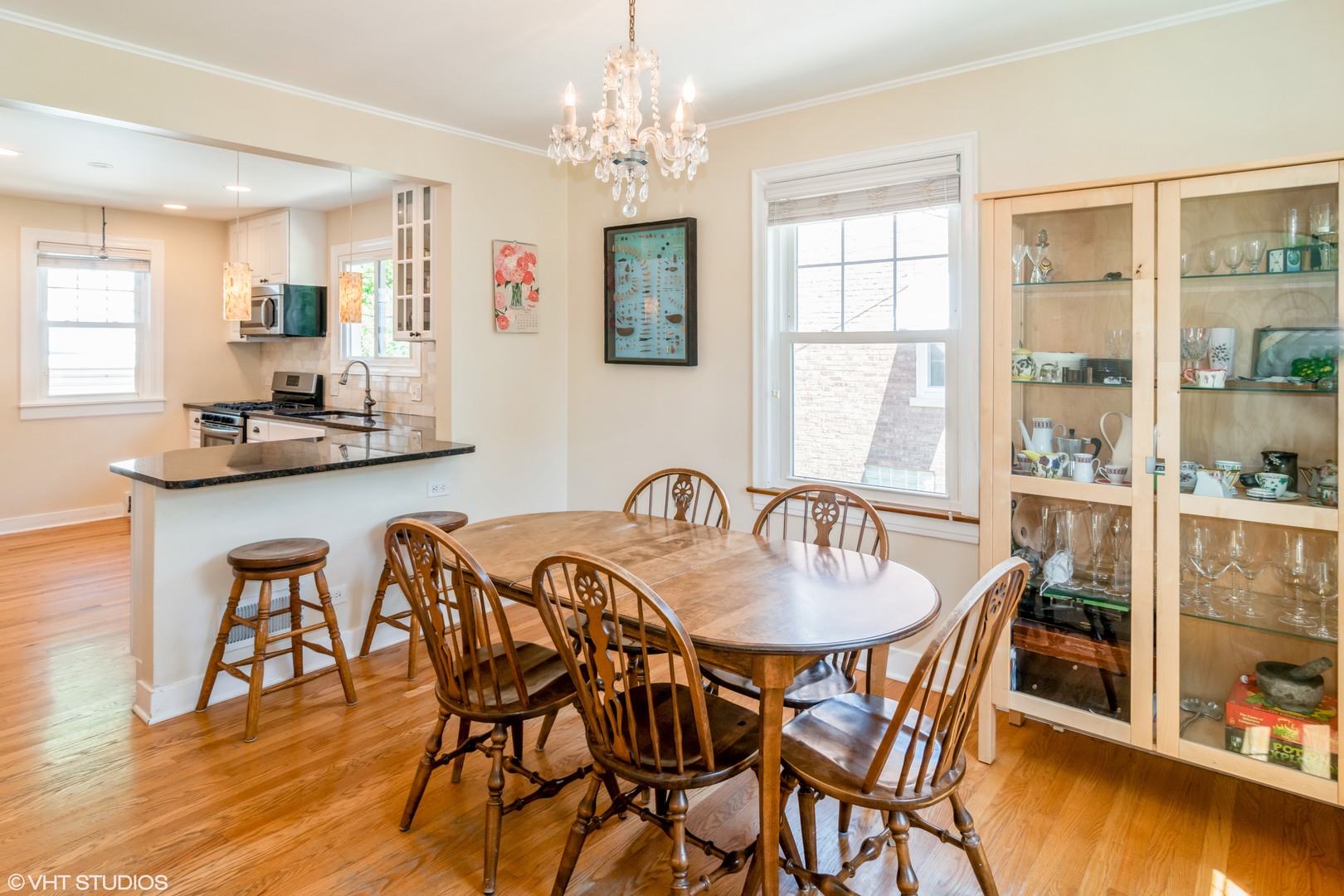 528 Selborne Road Riverside, IL 60546 - Photo 5 of 21 a view of a dining room with furniture and wooden floor