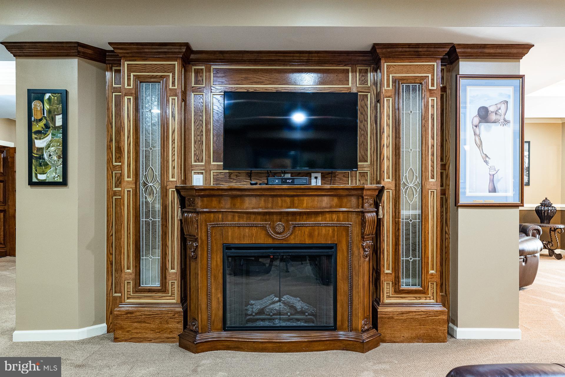 1454 Olmsted Drive Bear, DE 19701 - Photo 35 of 72 Lower level fireplace